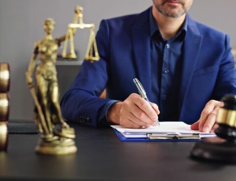 Personal injury demand letter being drafted by an attorney in a professional legal office